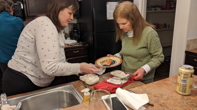 Wrapping the salmon (Merlin and Diane)