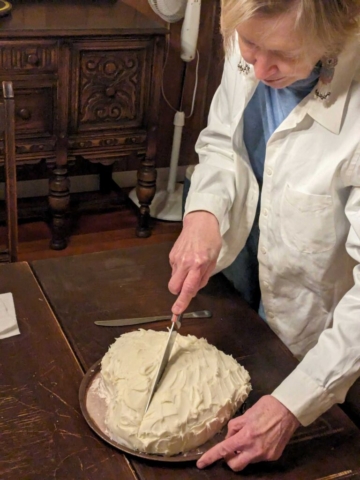 Althea carves her Red Velvet Valentine's Day cake